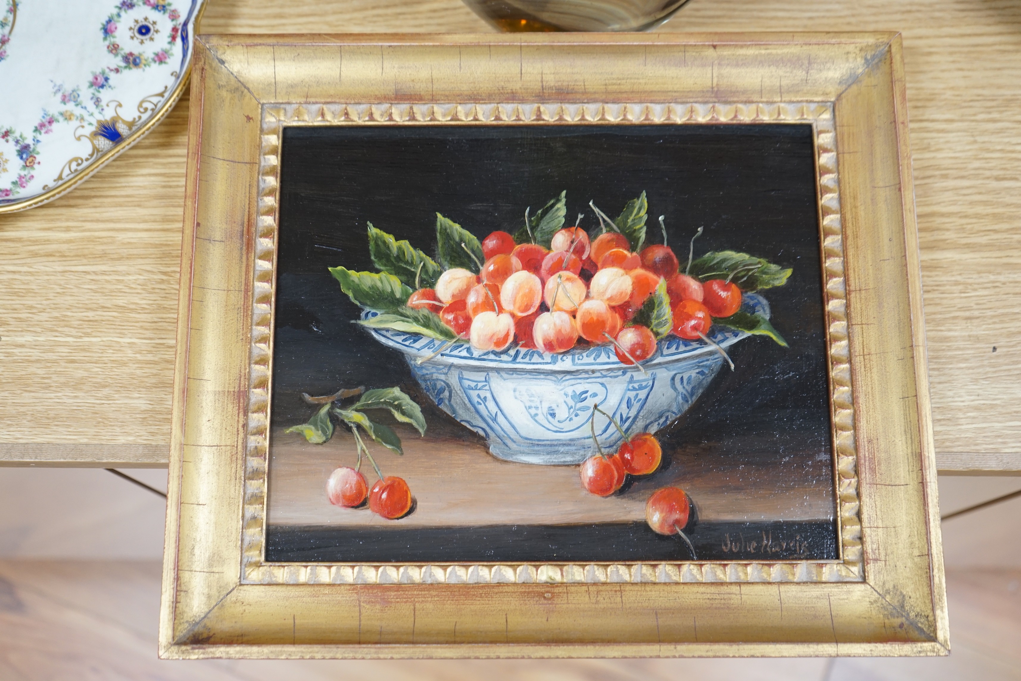 Julie Harris (b.1953), oil on panel, Still life of cherries in a delft bowl, signed, 20 x 25cm